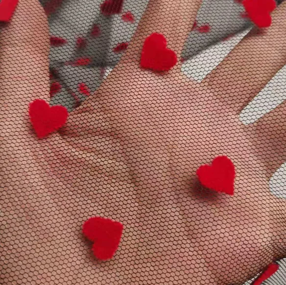 China manufacturer high quality fancy design soft tulle heart flocked mesh fabric for dress