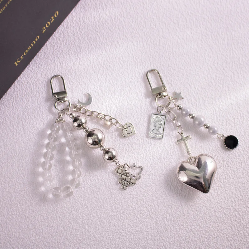 ins Sweet cool wind beaded Stars Moon bag key chain Metal black and white silver bear love cross car key chain pendant wholesale