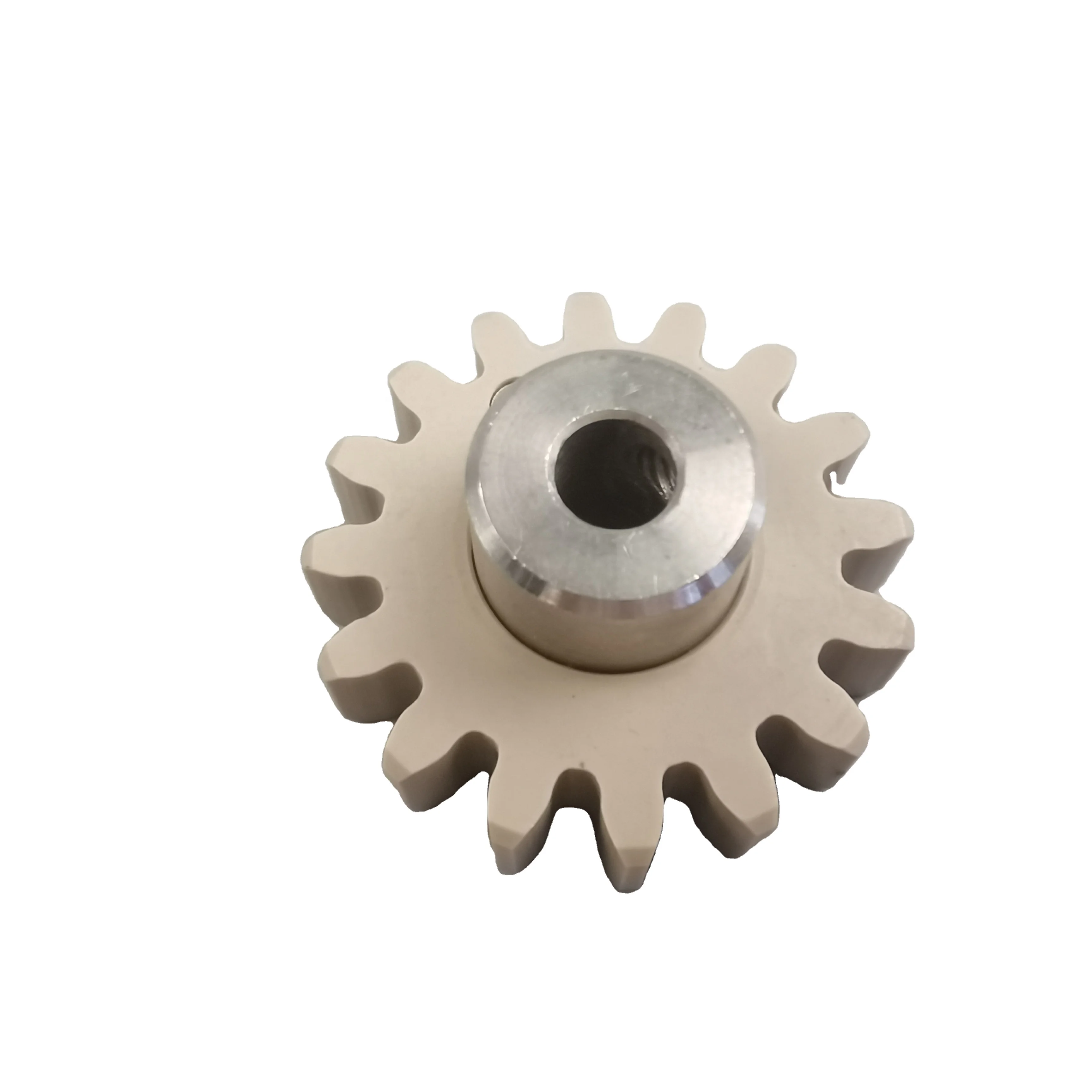 Spur gear of PP material for driving the rotation of the transmission shaft