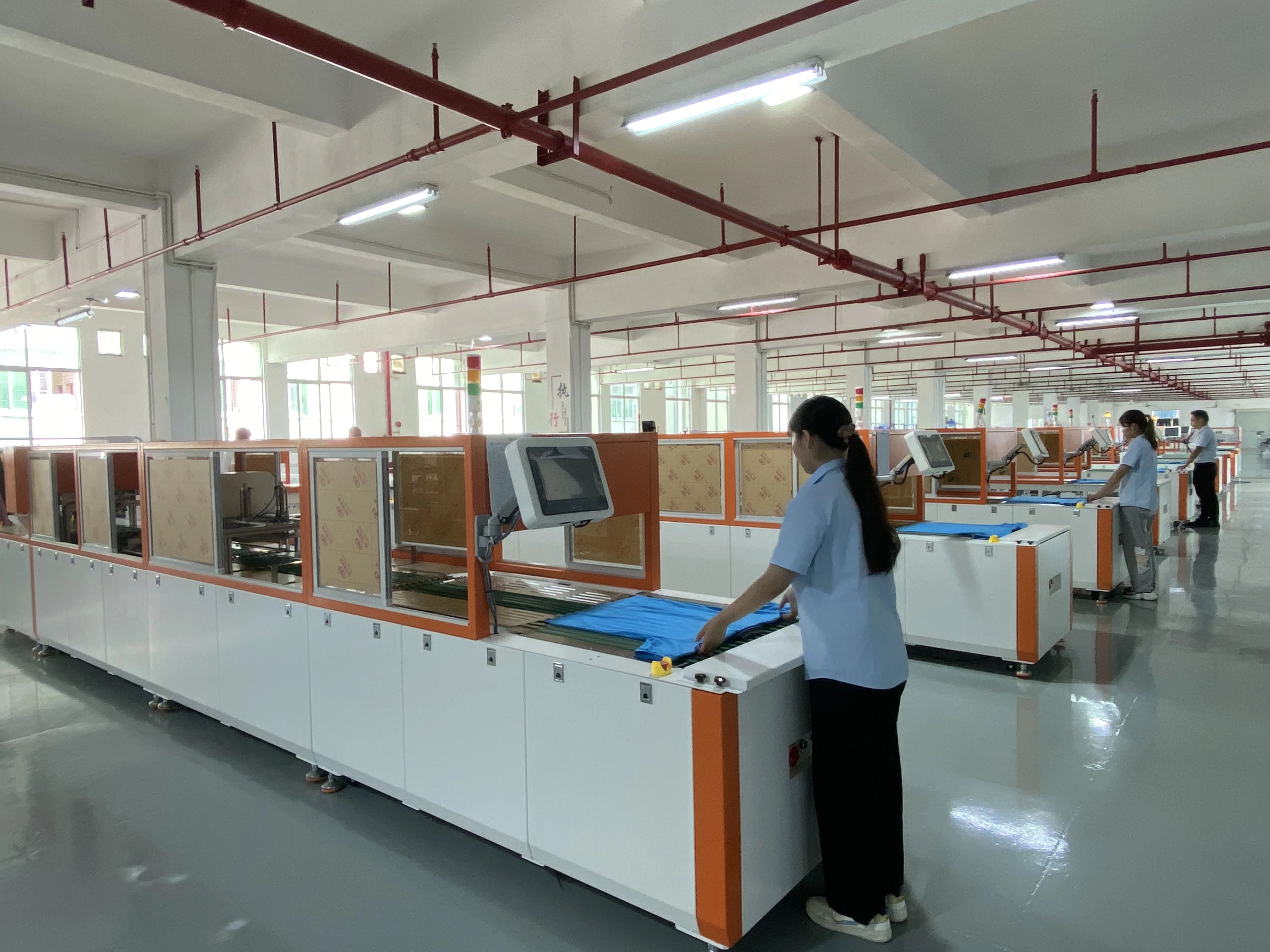 Automatic T-Shirts Folding And Packing Machine clothes folding packaging machine