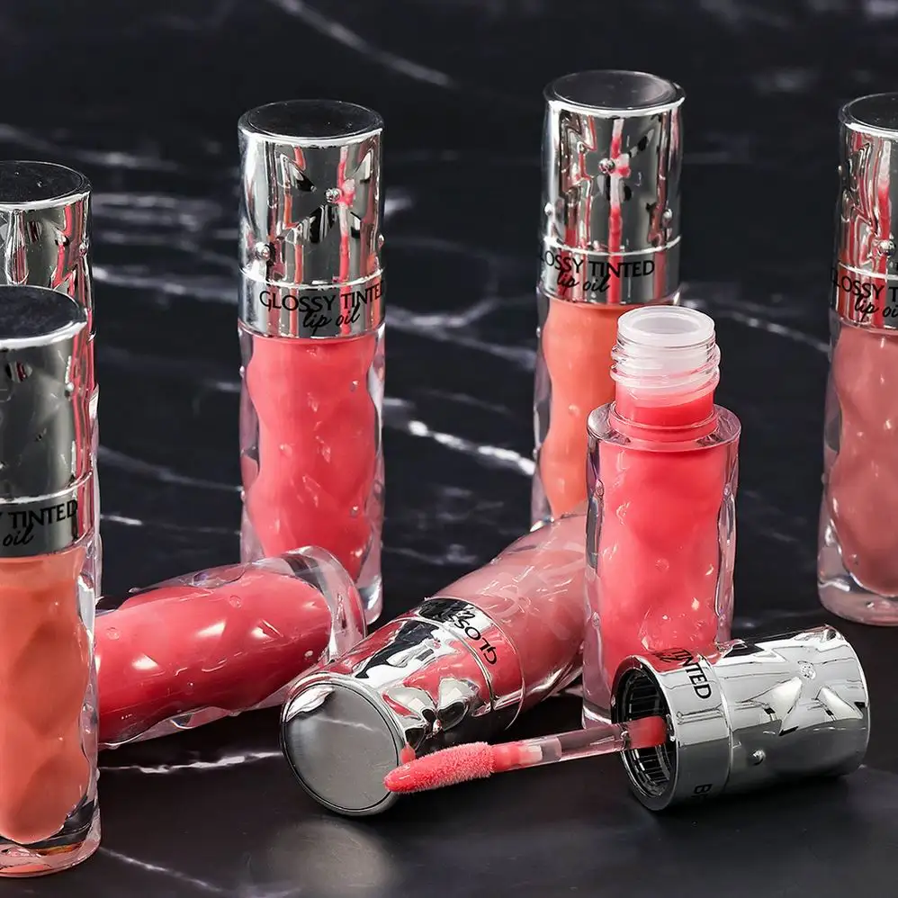 Premade Magic Low MOQ Turmeric Lemon Shea Butter Lip Oil Rose Gold Lip Tint Gloss Shimmer Moisturizing Glossy Lip Oil