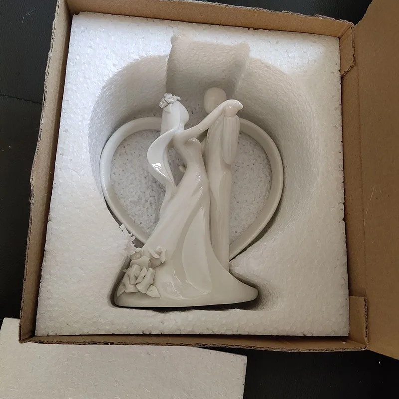 
Ywbeyond Wholesale Ceramic Dancing Bride and Groom Couple Heart Figurine Cake Topper wedding Table decoration 