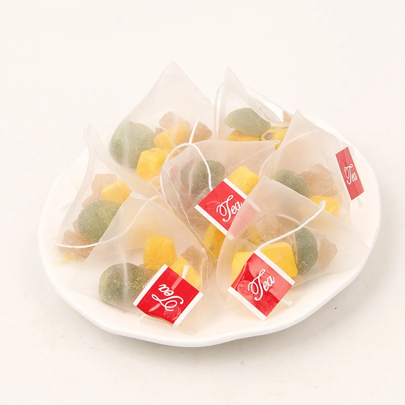 Wholesale Dried  Flavor Tea Pyramid Triangle Tea bag Mixed sweet fruit Kumquat Passion Tea