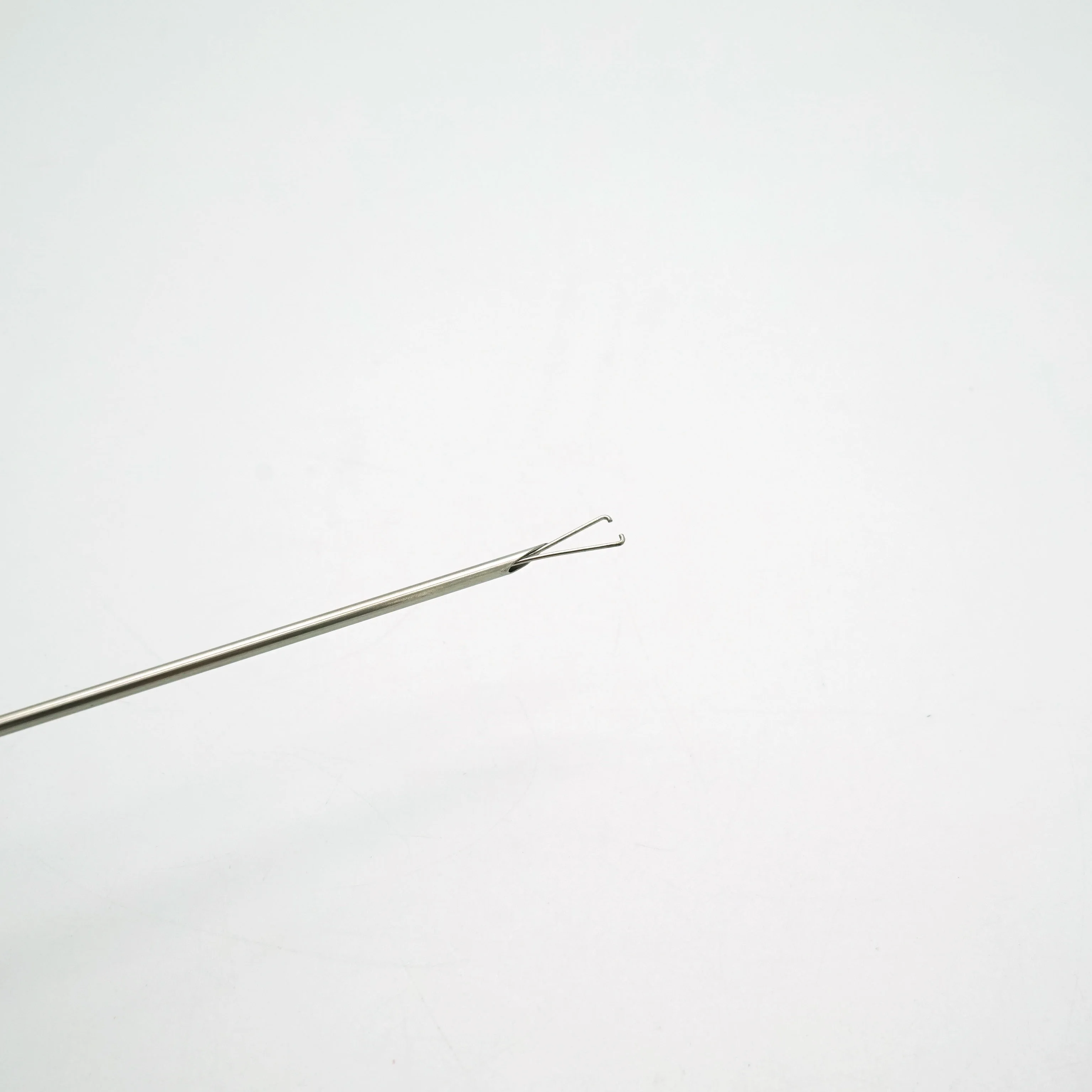 Laproscopic surgery Suture grasper closure device