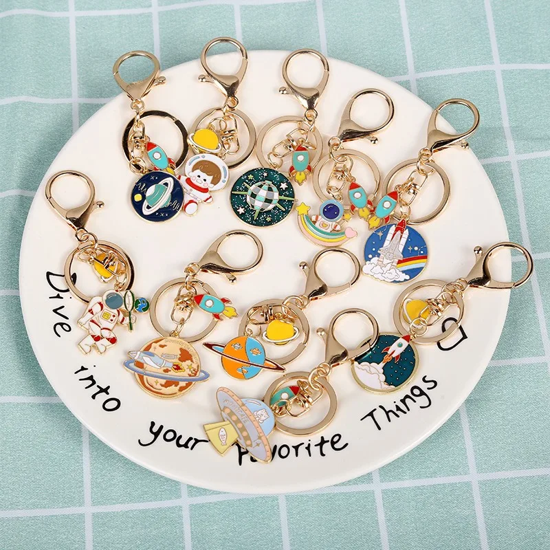 Wholesale Cute Cartoon Students Metal Keychain Bag Car Key Pendant Alloy Universe Starry Sky Rocket Astronaut Keychain