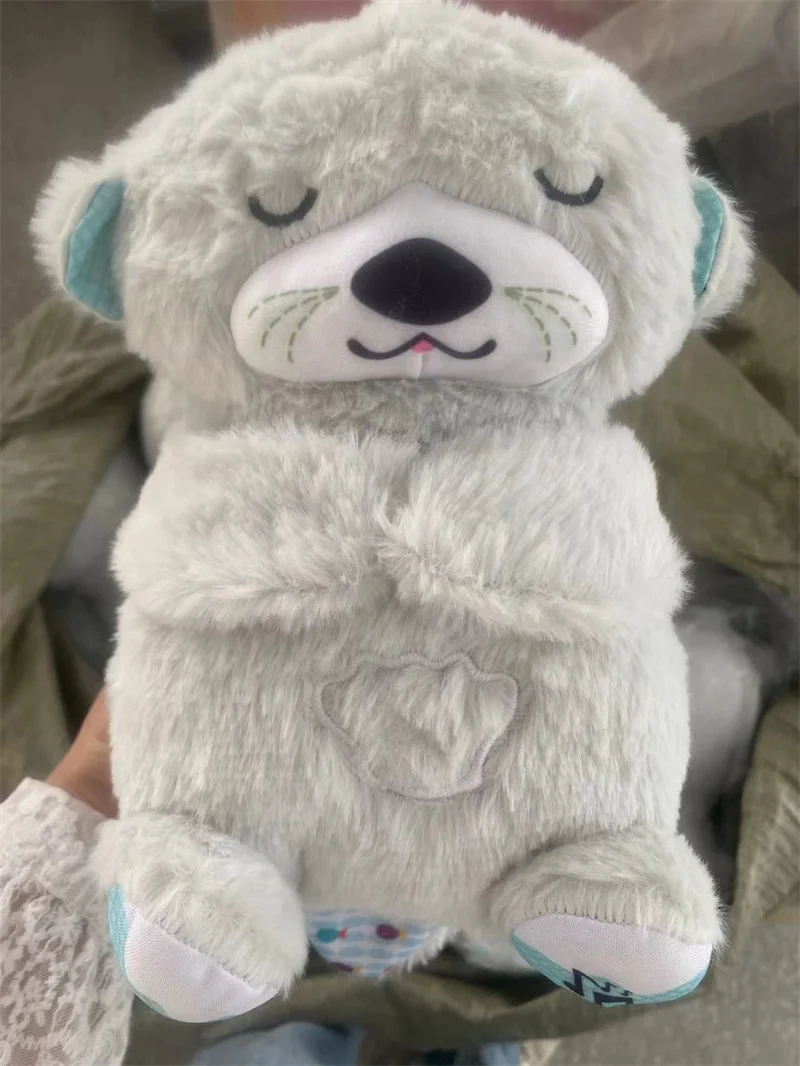 DOULUO sleeping bear with music and light hot selling product Stittch Plush toy breathing otter teddy bear with Sound