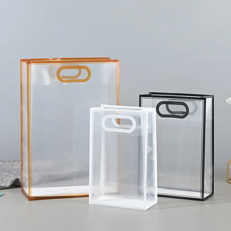Manufacturer customized waterproof PVC handle bag transparent PP frosted plastic clothing bag promotional shopping gift bag