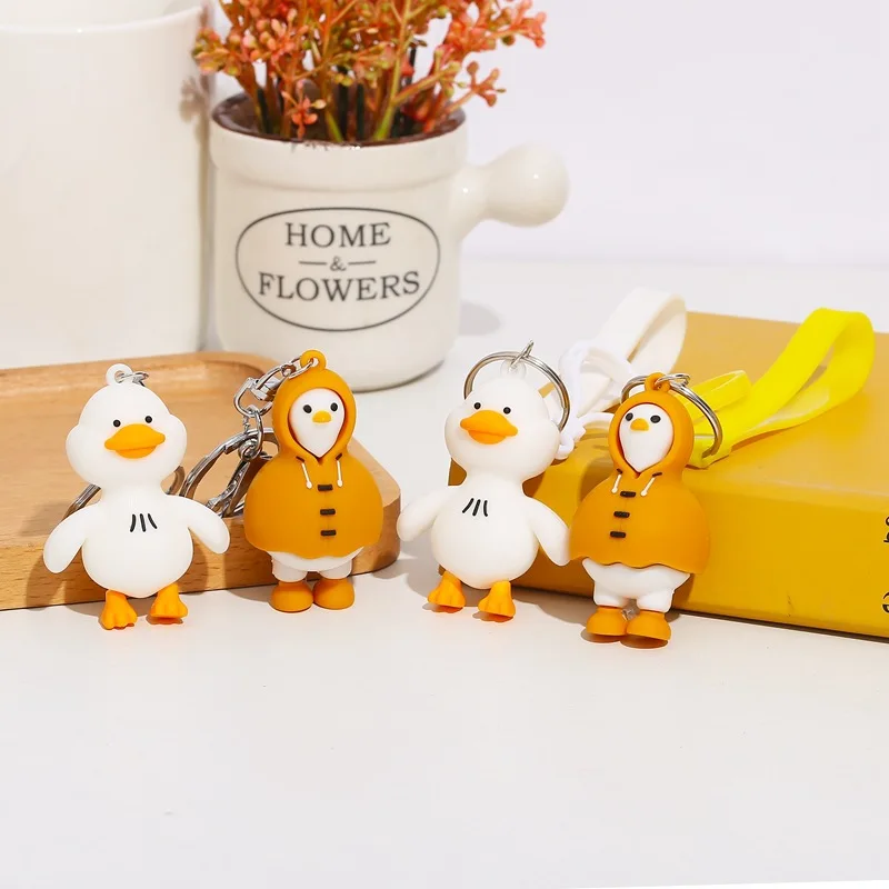 Wholesale newest creative pendant cute cartoon raincoat duck key ring chain