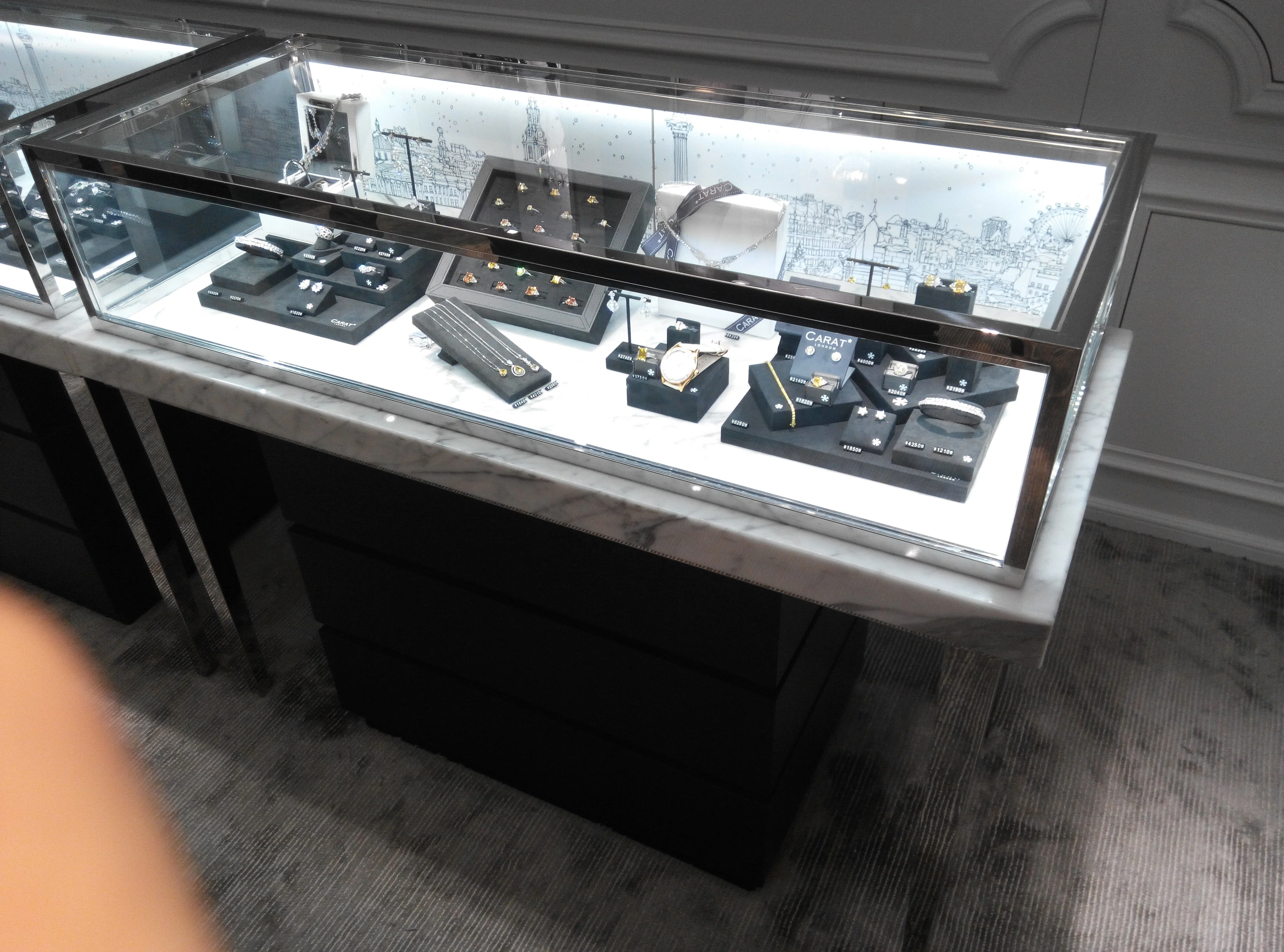 
Luxury high-grade marble curved glass jewelry display cabinet showcase with LED light 