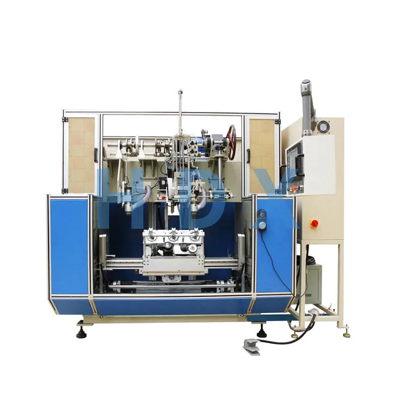 Five-axis three-head broom, hair-drilling and planting machine