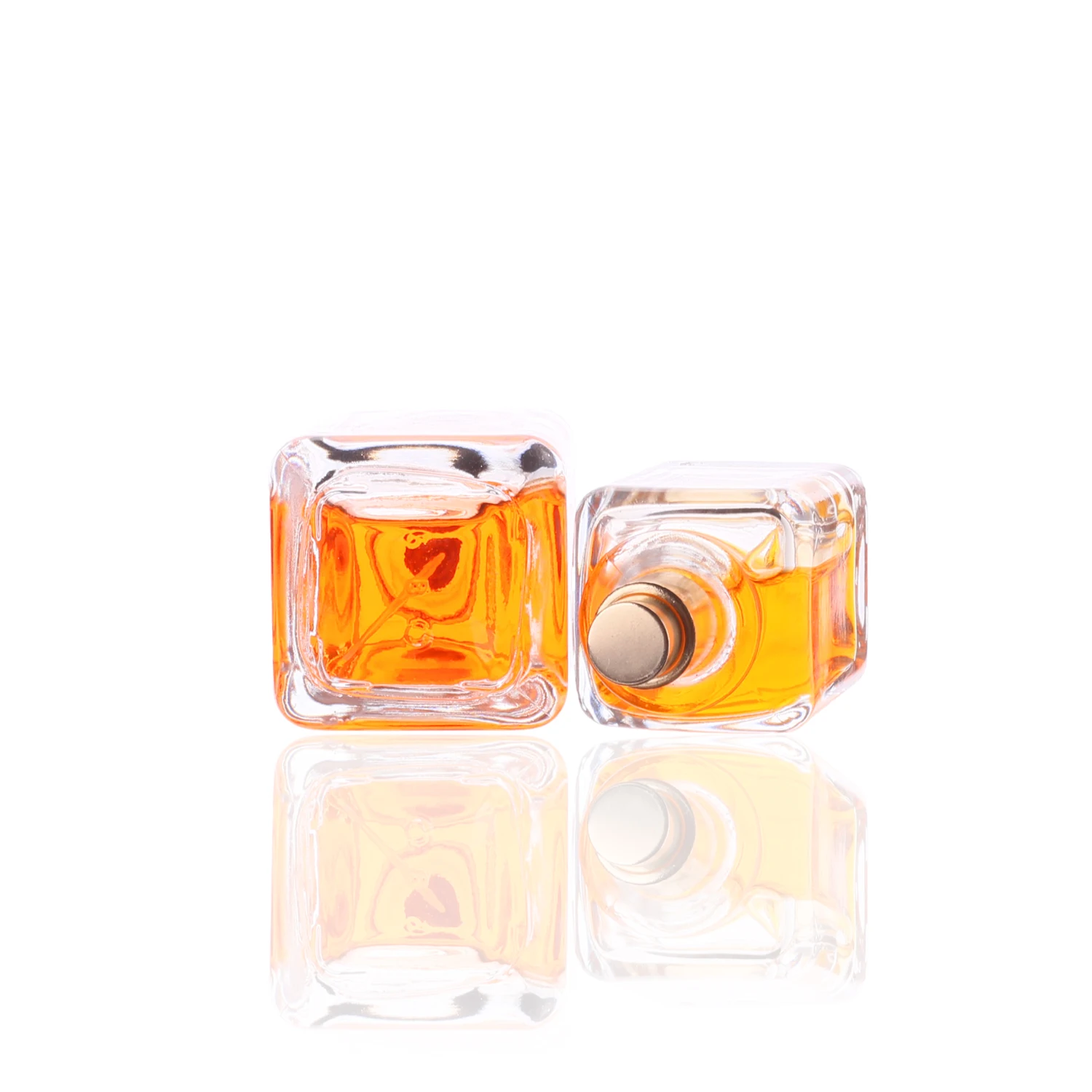 Hot Sale Wholesale Square Unique Shaped 30ml 50ml 100ml  Glass Perfume Bottles with Customized Colored Resin Ball Lids