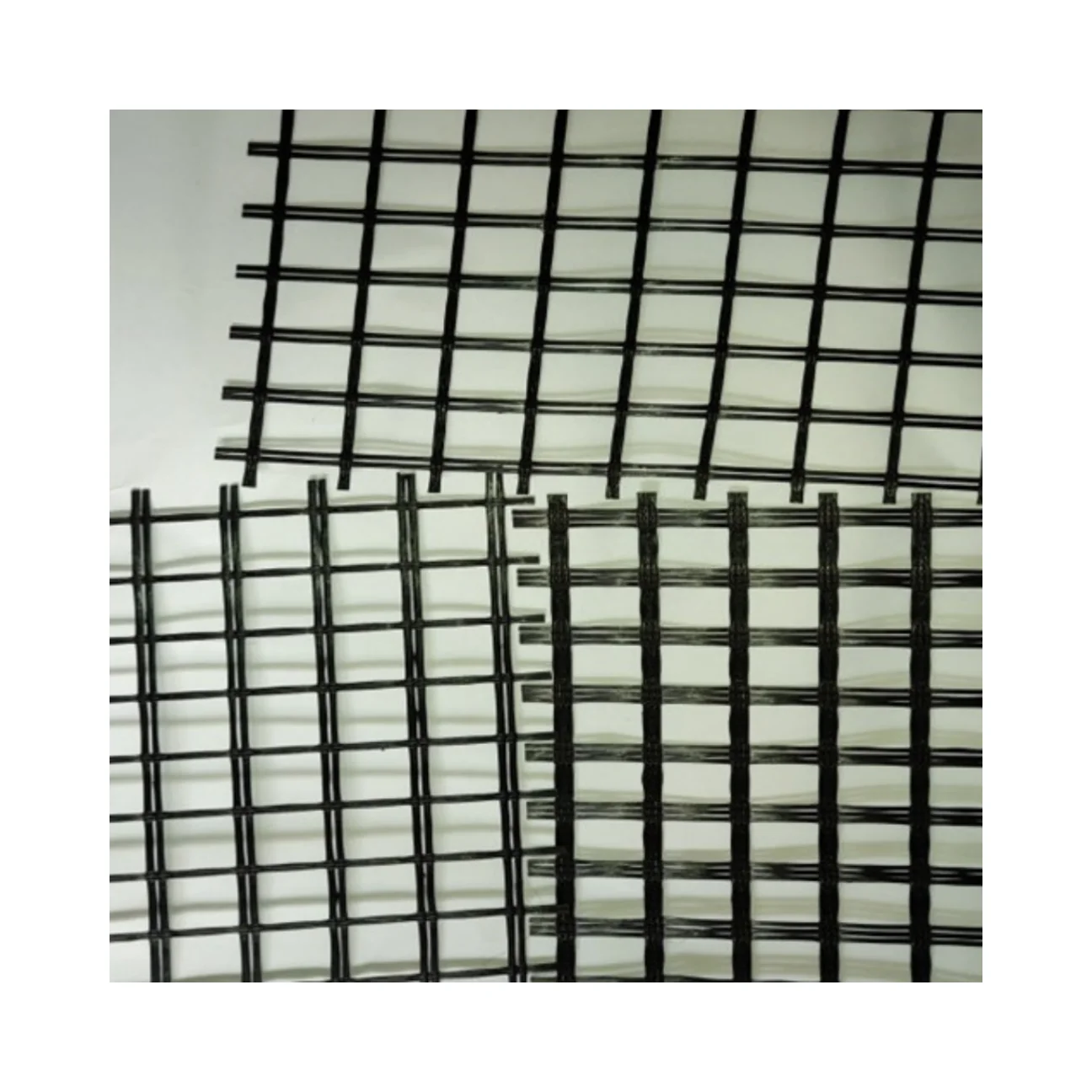 High Tensile Strength Bitumen Coated Composite Nonwoven  Fiberglass Geogrid  for Asphalt Overlayer Reinforcement Gravel