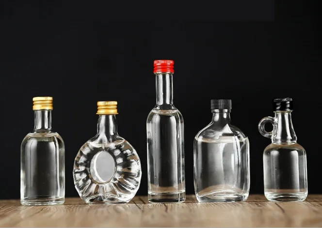 glass bottle  50ml transparent glass small empty wine creative Mini sealed fruit juice beverage flat round wine bottle