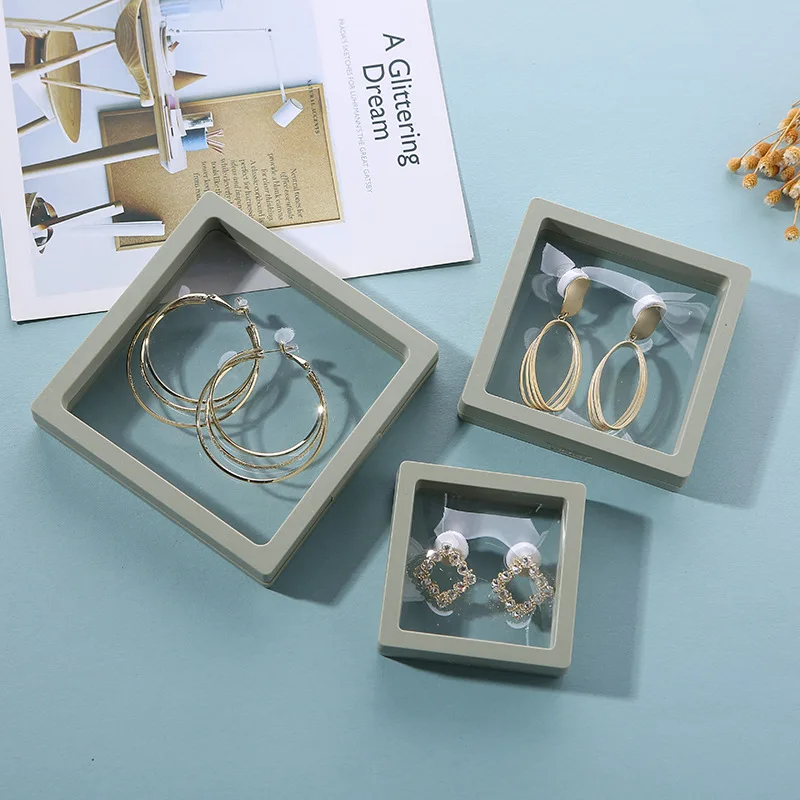 Colorful 3D packaging cases free stand plastic floating frame display gift pe film jewelry storage box