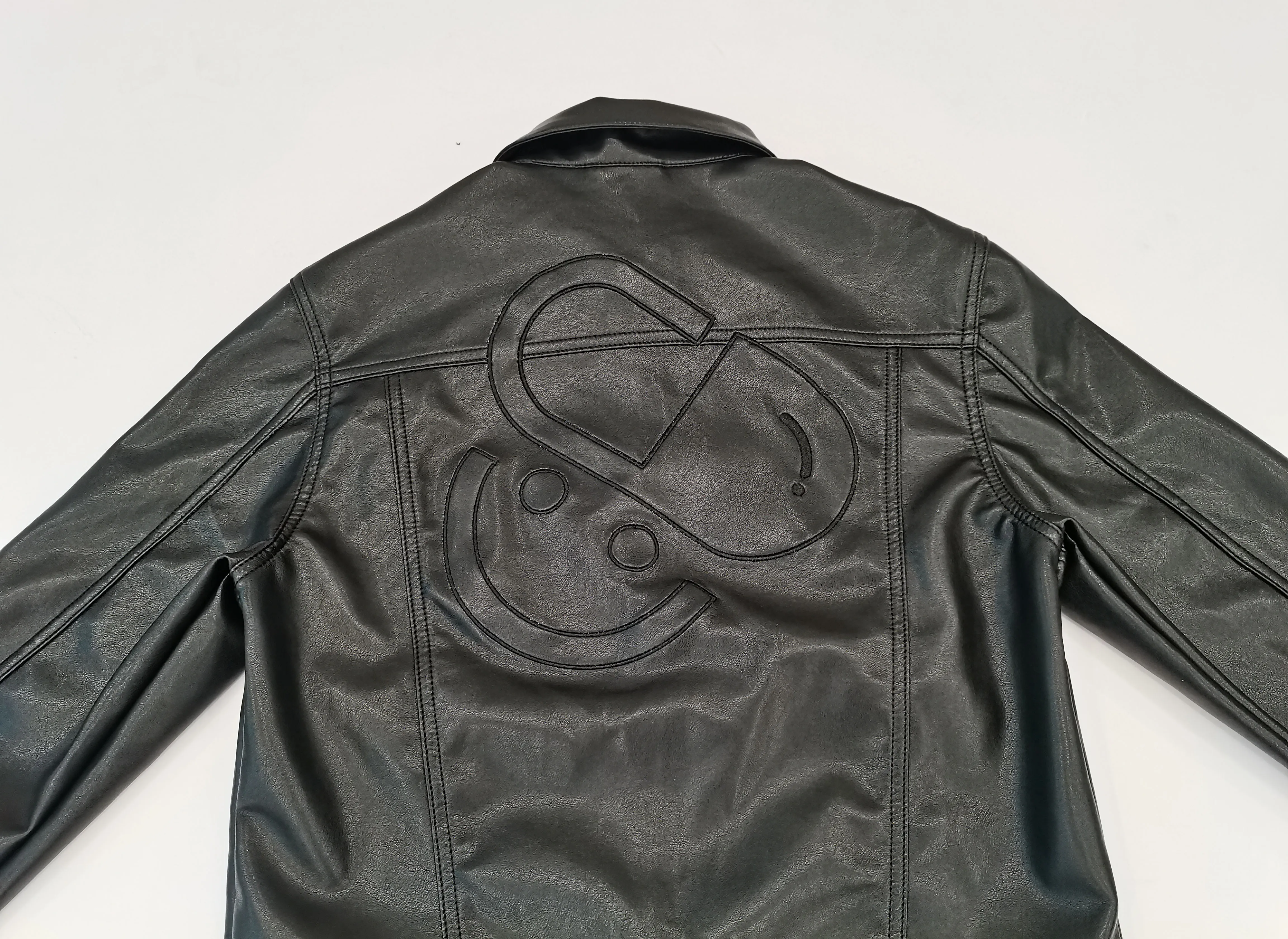 Custom black mens pu leather jacket with patch embroidery