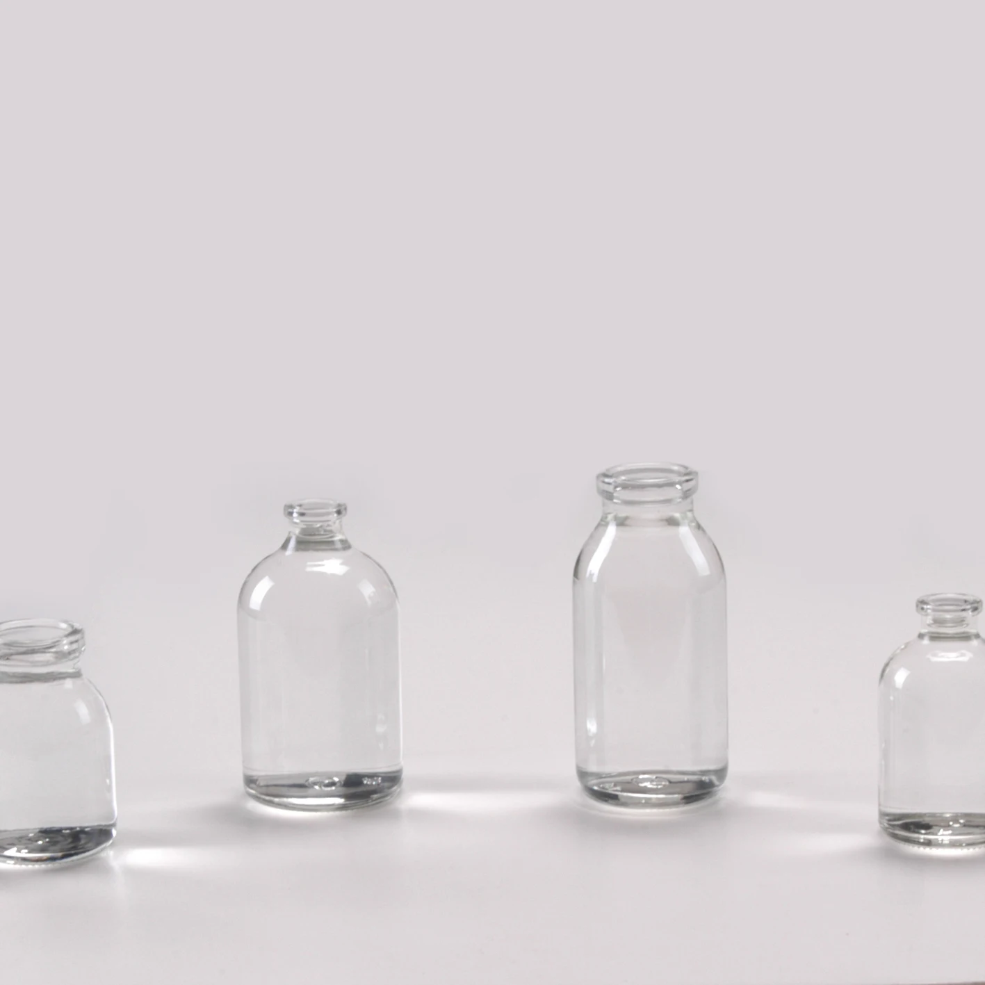 Factory direct 100ml clear glass  moulded injection  vials with rubber stopper and aluminium cap for medicine