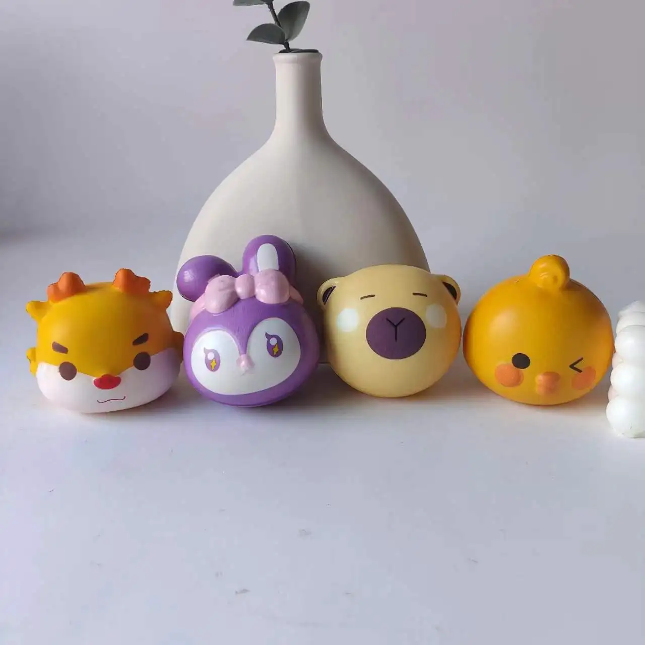 Wholesale hot selling relief popular animal head elastic rabbit chicken dragon kids squeeze PU slow rebound fidget toy