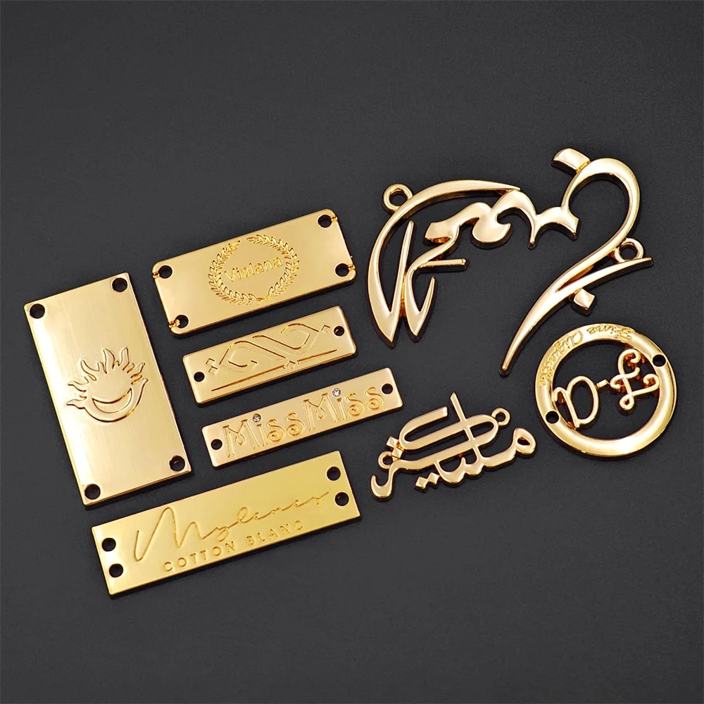 Embossed abaya design metal clothing labels custom brand plate metal tags handbag custom metal logo for bags clothes clothing