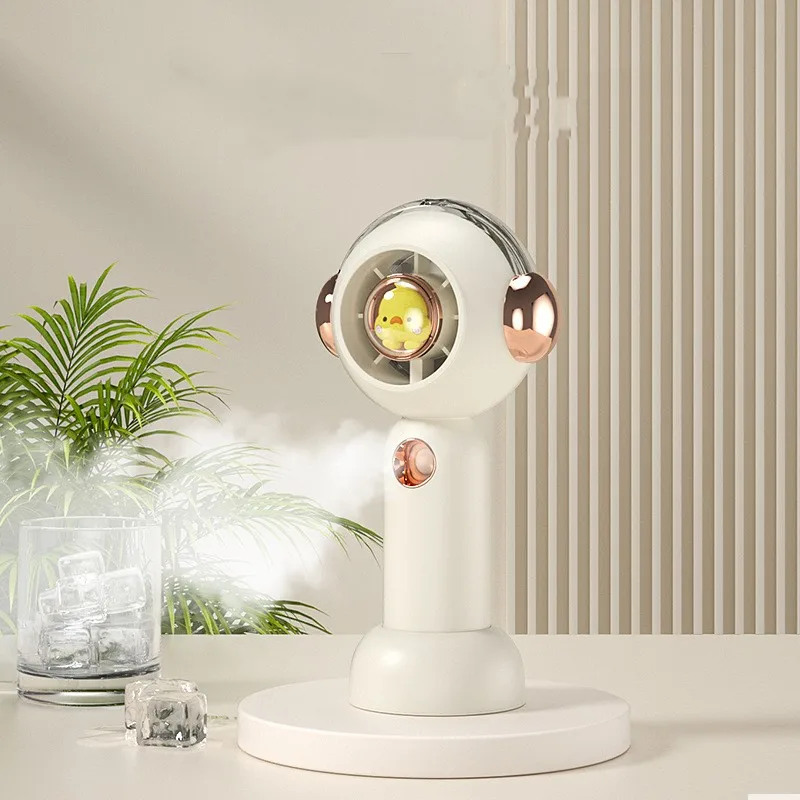 New handheld fan spray cooling fan portable mini student cartoon cute electric fan USB