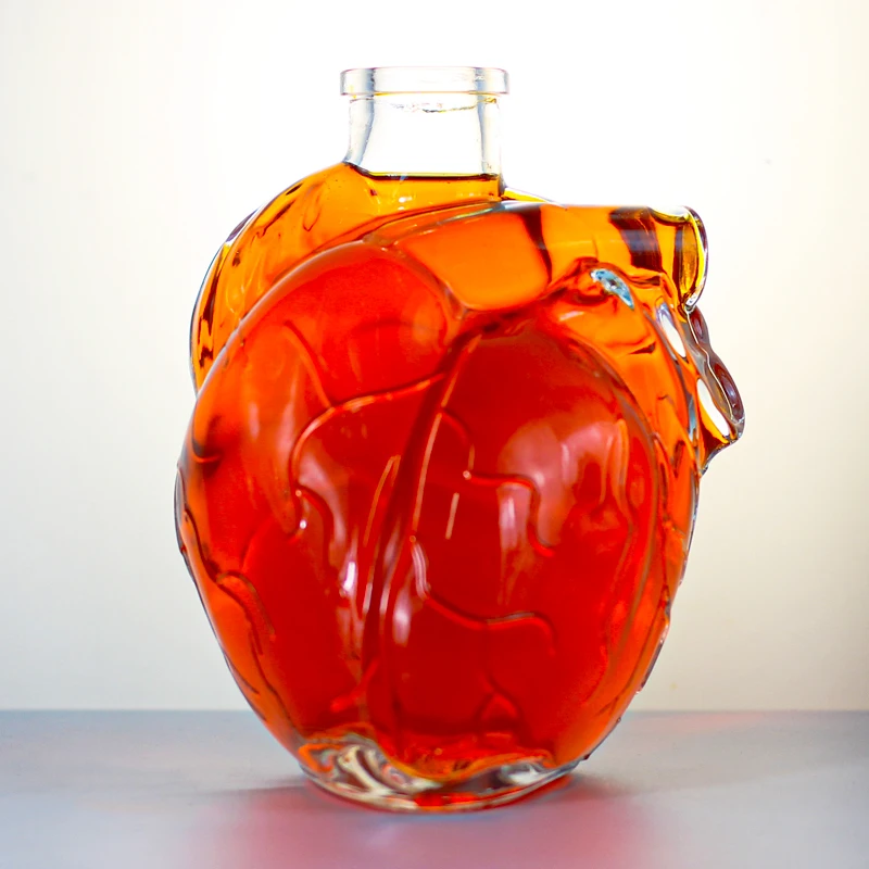 Unique Design heart shaped 750ml 1000ml transparent glass liquor wine Whisky Vodka tequila bottle with cork