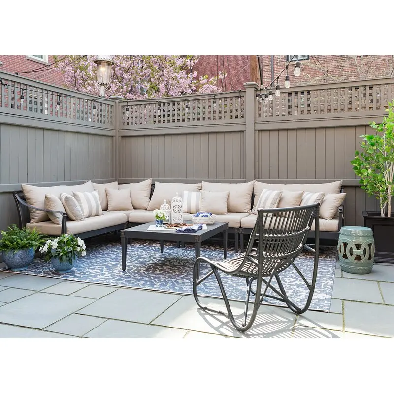 The modern Chinese side table is exquisitely made of green ceramics. The hollow shape can be placed in any space.