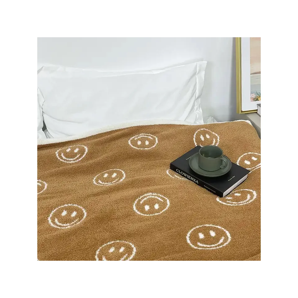 New design factory price personalized super soft warm smiley face knitted throw blankets for sofa bed