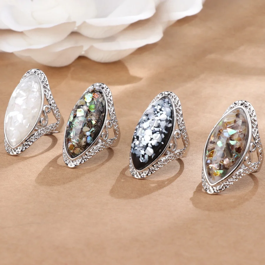 
Wholesale retro magic color shell ring alloy ancient silver carved big ring couple models 