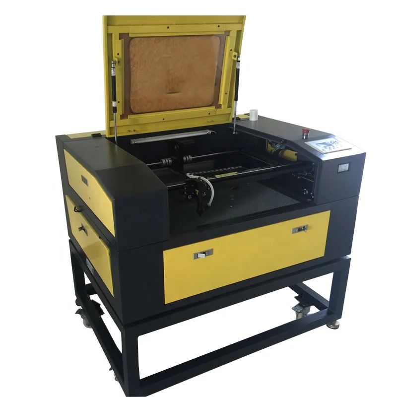 Co2 cnc laser engraving machine laser cutting machine working for wood acrylic leather glass paperboard cutting