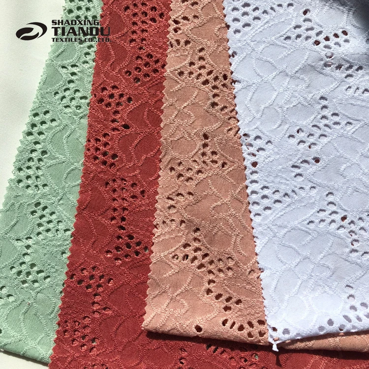 
Super soft Embroidered Solid DTY eyelet knitted jacquard 95% polyester 5% spandex stretch fabric 