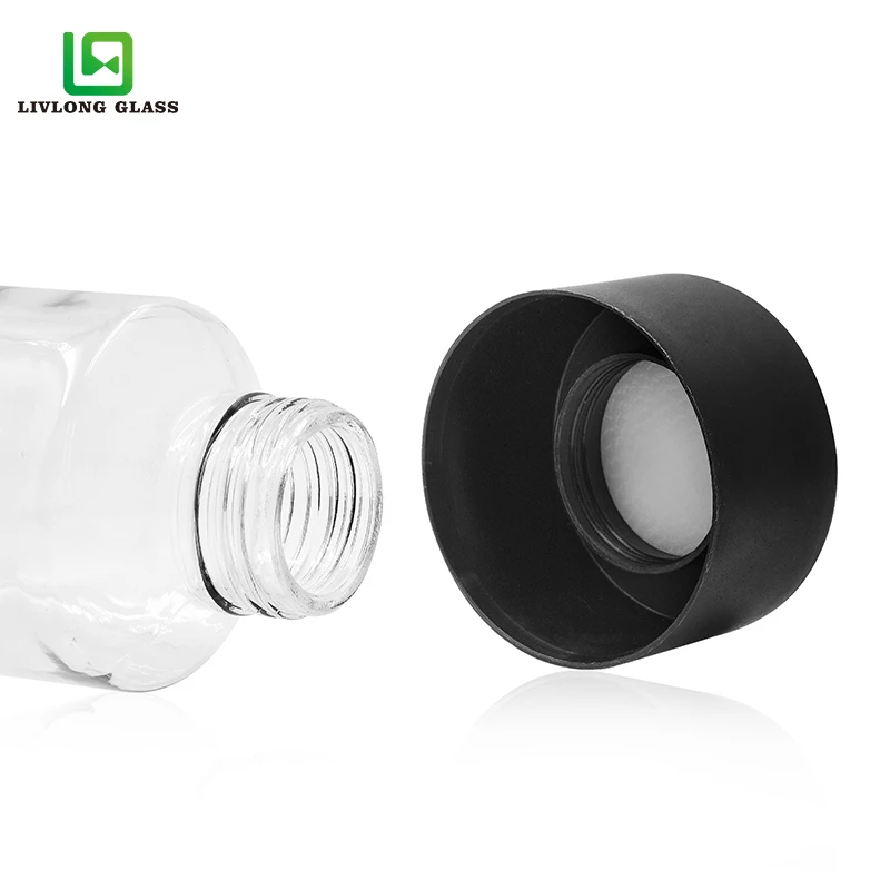 Wholesale 500ml 16OZ clear round voss drinking glass water bottle with screw CAP