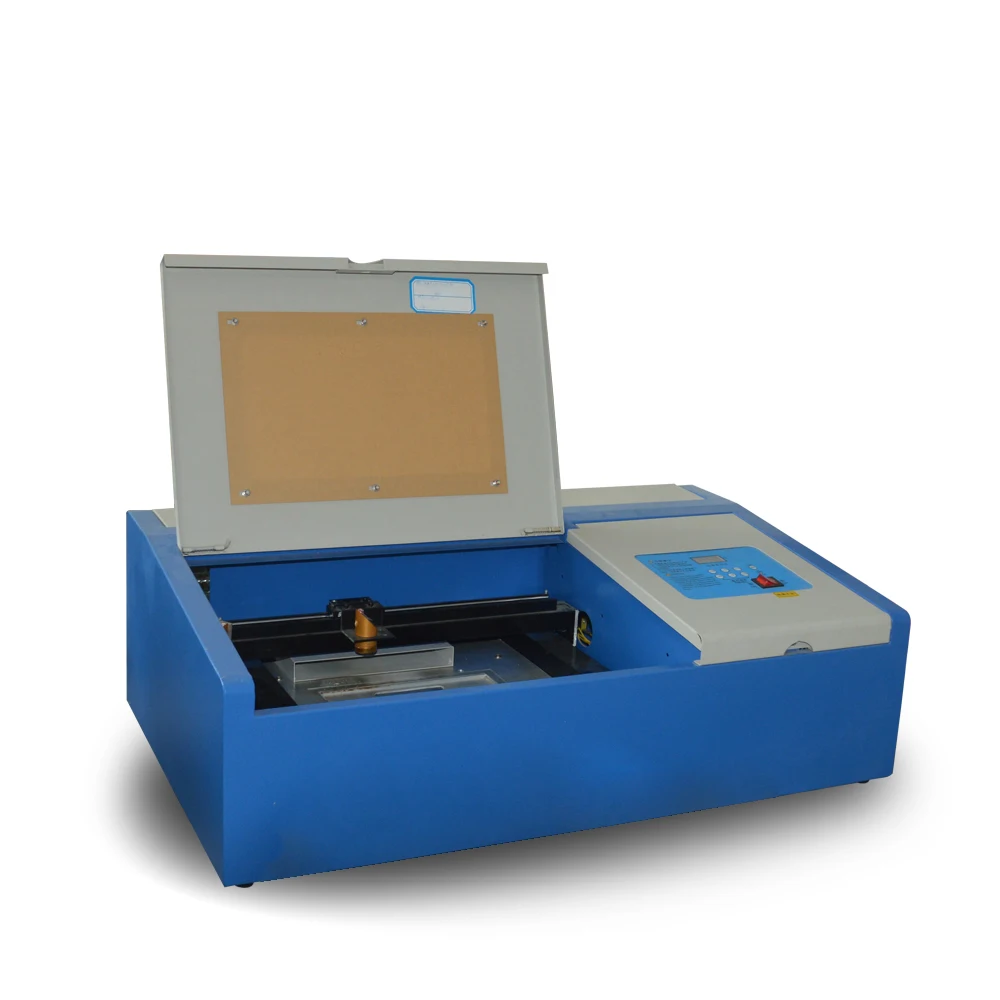 Mini co2 glass tube laser engraving cutting machine for Clothing