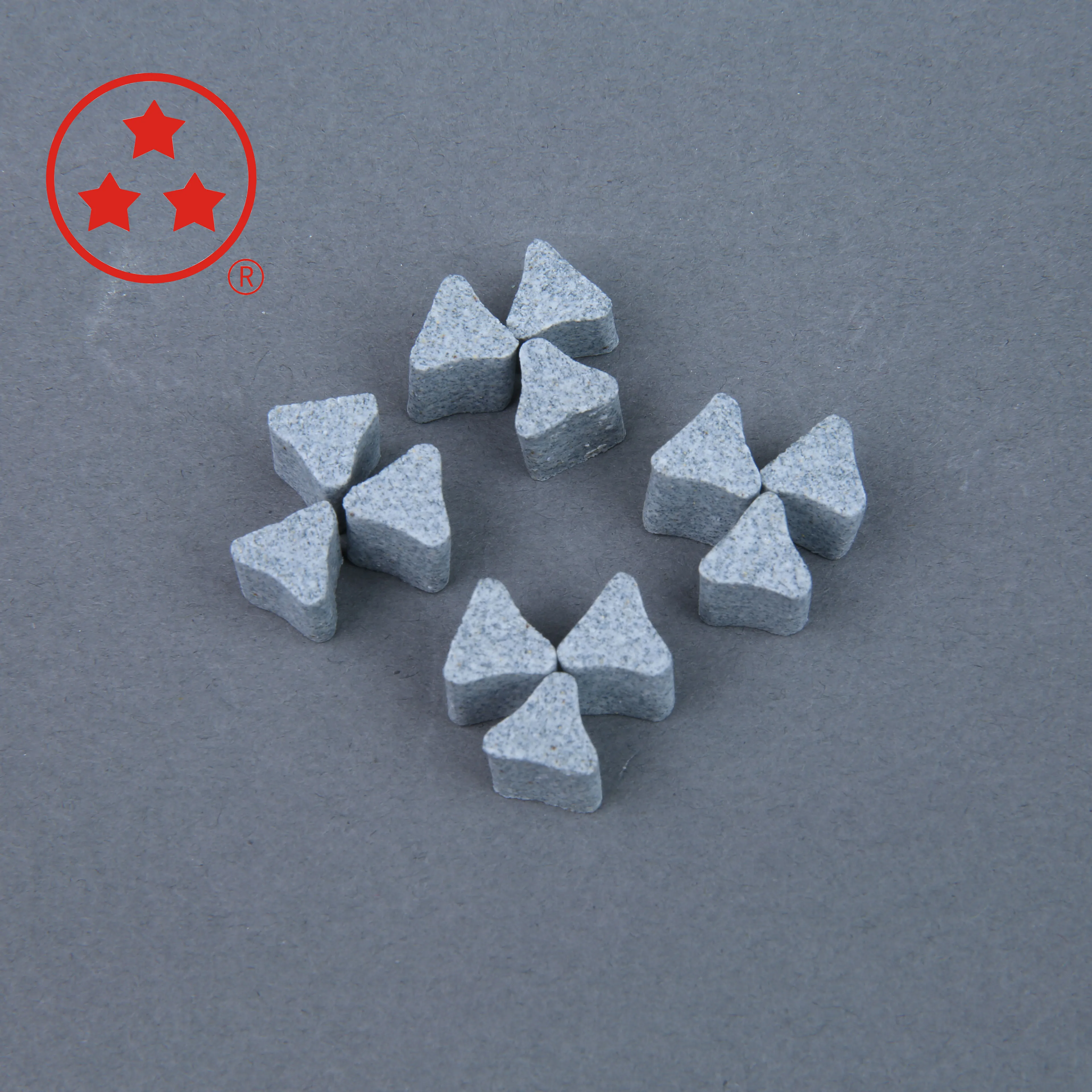 Mass finishing ceramic deburring media