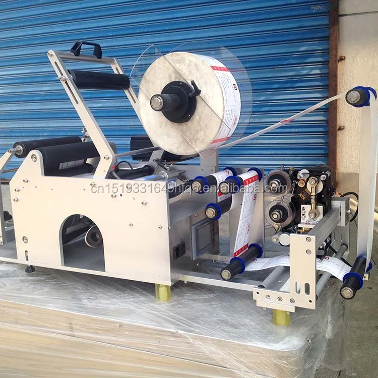 universal use Quality assurance manual labeling machine for oval labeling machine for plastic container multifunction new design 2022