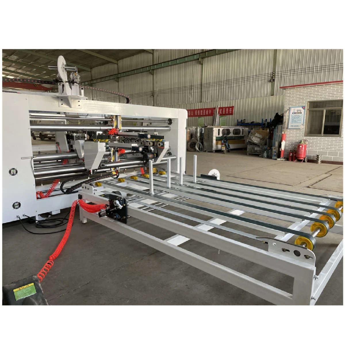 Carton packing stitcher/corrugated carton box machine