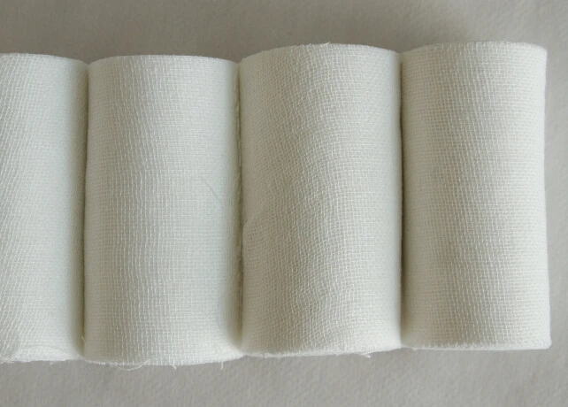 Automatic high speed Medical Cotton Gauze Bandage Rolling Cutting Packing Machine