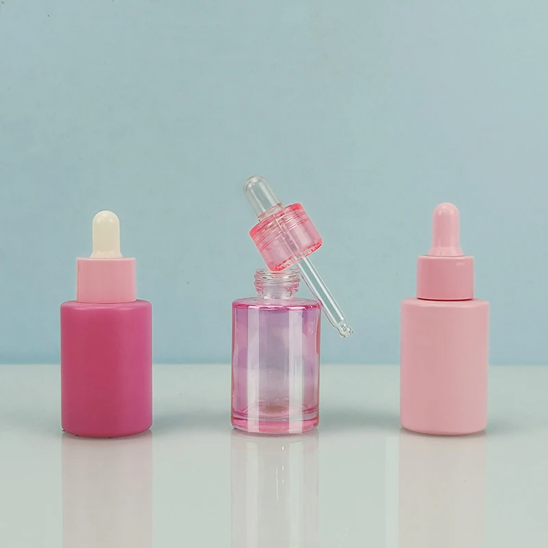 1oz 2oz 30ml 50ml Luxury Round Shape Pink Cosmetic Face Serum Essential Oil Glass Dropper Bottle With Packaging Box