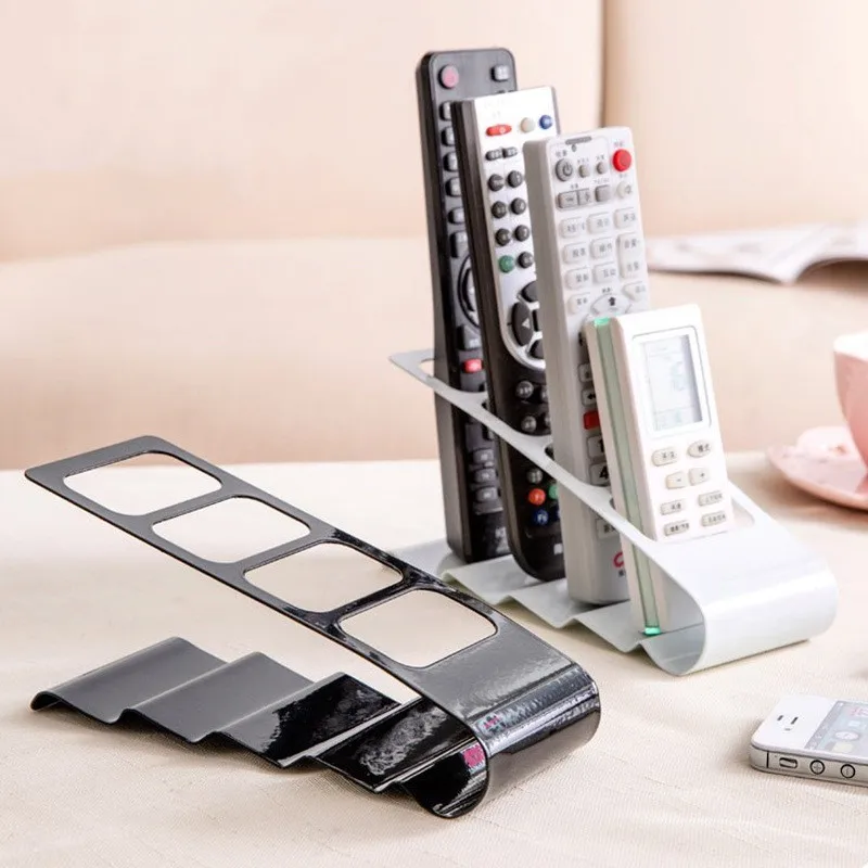 Creative four-compartment remote control storage rack office desktop