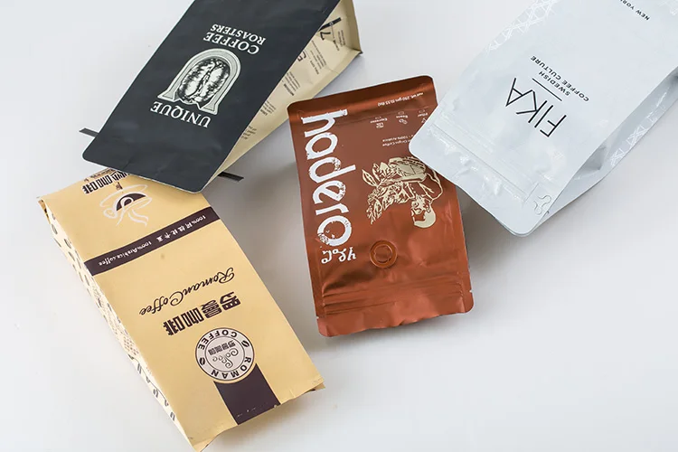 China manufacturer matt flat bottom black and white stand up coffee been pouch bag 250g 500g 1 kg with zipper and valve