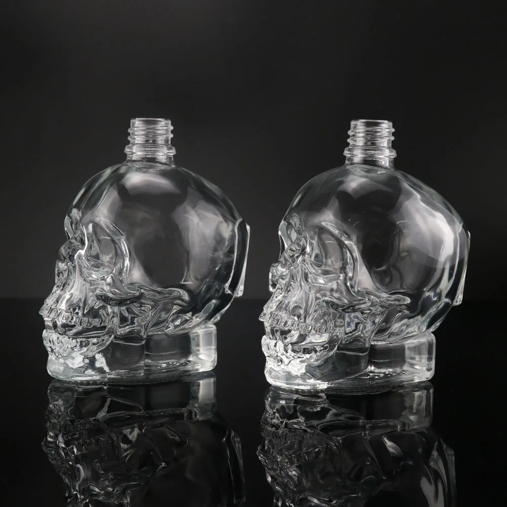 Unique Design Empty 15ml 30ml 100ml Skull Glass Perfume Diffuser Bottle With Spray Cap