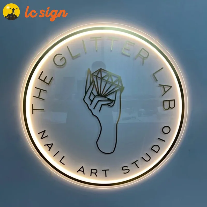 Acrylic white logo with LED light. Golden mirror letters, business signs for beauty salon, boutique, barber shop