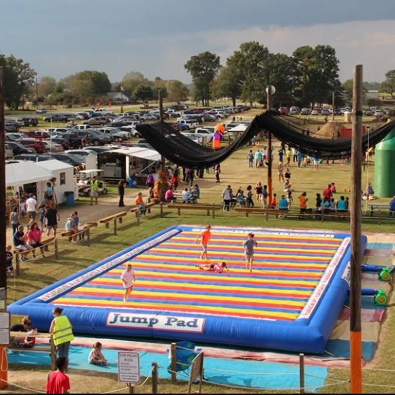 Outdoor kids n adults giant inflatable jumping pad made of 0.55mm pvc tarpaulin from China jumping pillow factory