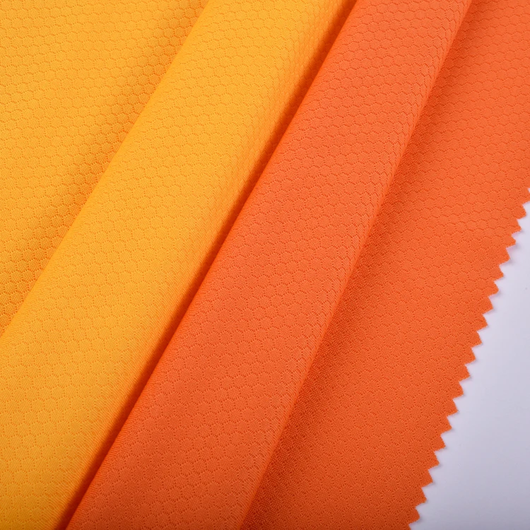 Factory sale 100%polyester double faced jacquard football grid interlock bird eye mesh fabric for football suit