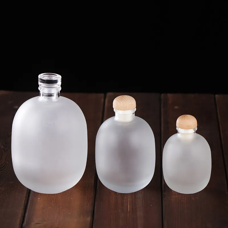 Customized 250ml 500ml Transparent Frosted Heavy Bottom Boston Liquor Beverage Fruit Wine Glass Bottle With Cork