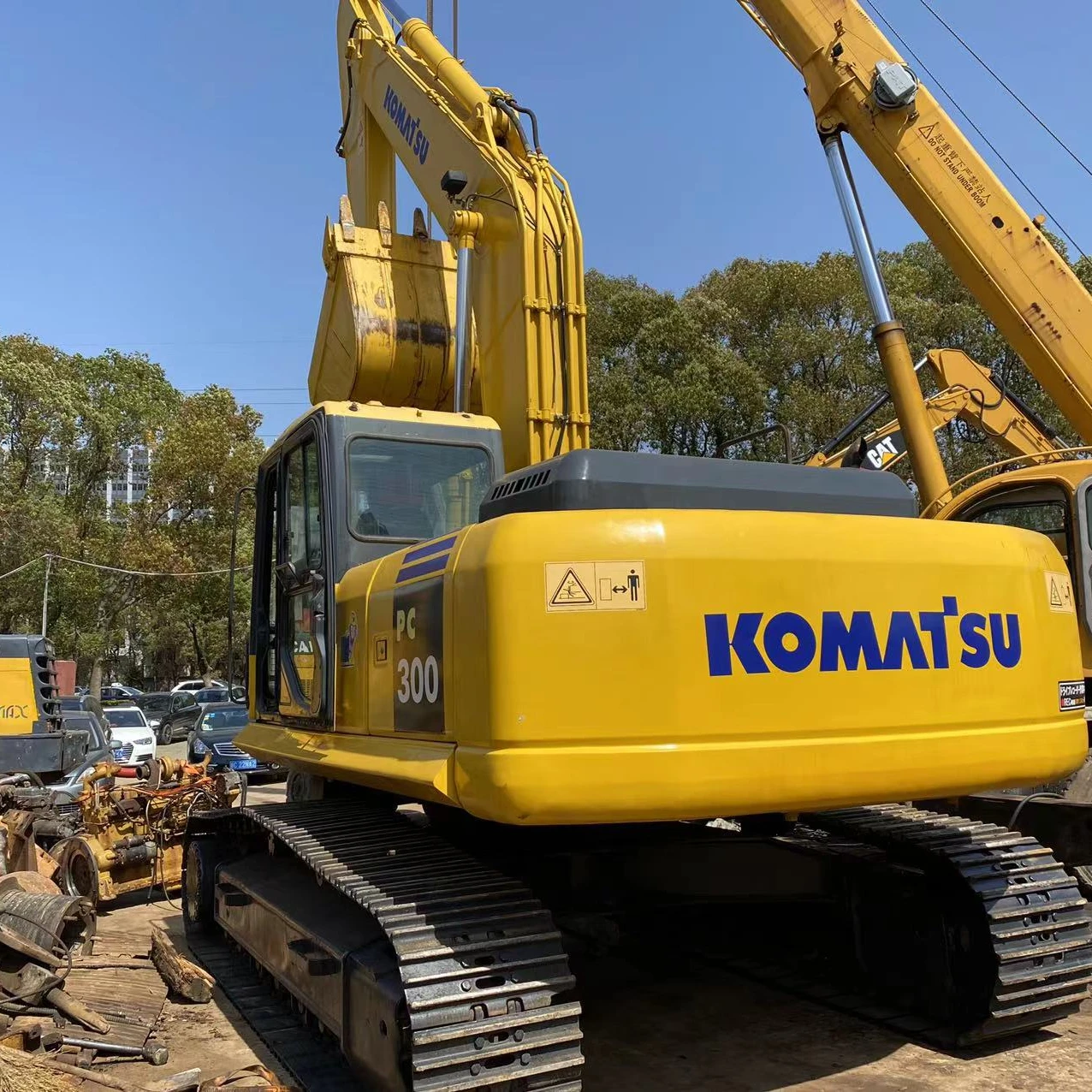 Дешёвый бывший в употреблении Япония Komatsu PC300-7 экскаватора/б/у 30 тонн Колесный экскаватор цена PC300 для