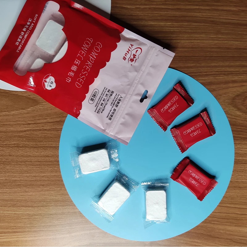 Hot selling 20 pieces 100% portable non-woven compressed towel magic