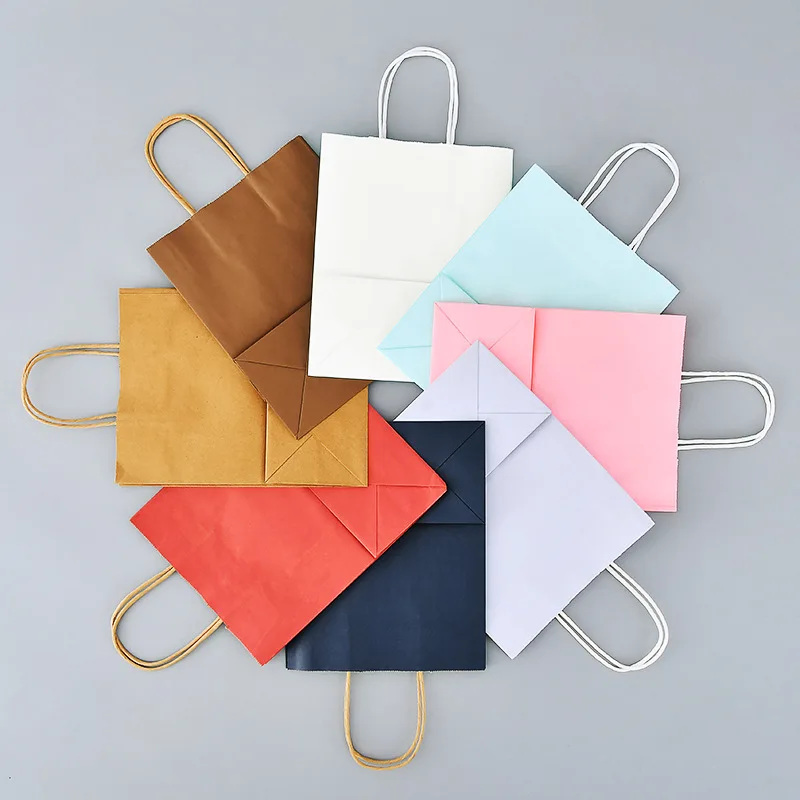 Hot selling factory price good quality white kraft paper bags shopping bag with your own logo with handles