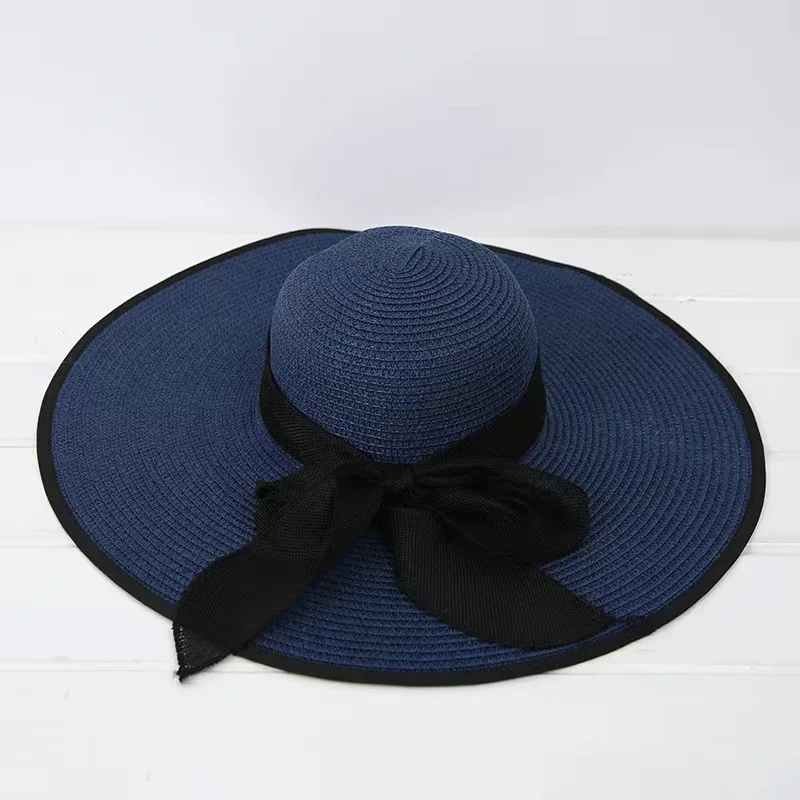 2022Summer new straw hat bowknot sunshade big hat along the ladies beach sunshade big straw hat manufacturers wholesale