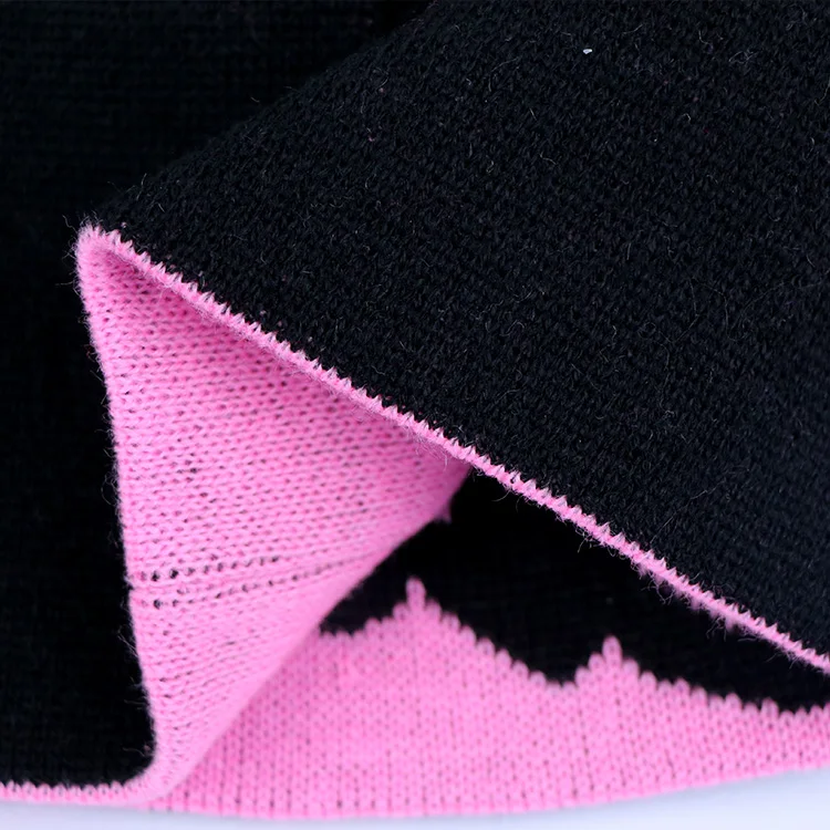Qianzun manufacturers pink letter logo cuffless acrylic custom jacquard knit reversible beanie hat