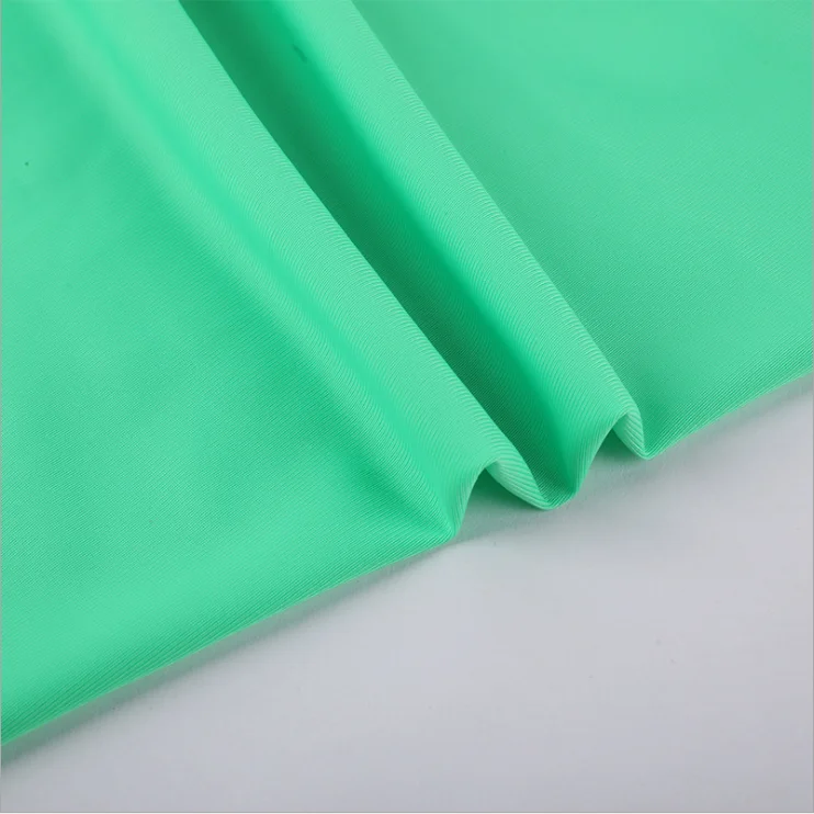 
Warp knit full dull 4 way stretch nylon lycra swimming fabric wholesale with good color fastness 