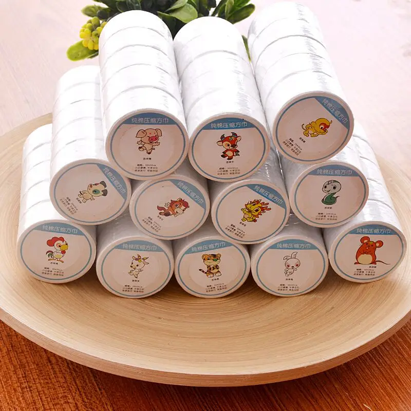 China Hot Sale Round Shape Magic Compressed 100% Cotton compact Guest Towel